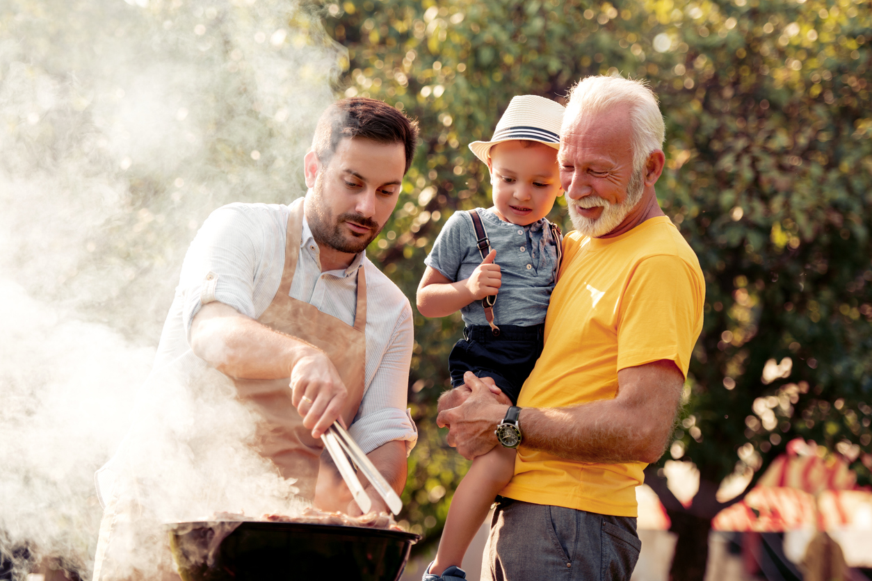 Family grilling outdoors